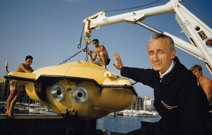 Who is Jacques Cousteau and what was his involvement in the development of scuba diving